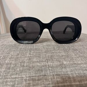 Loewe Glossy Black Oval Sunglasses